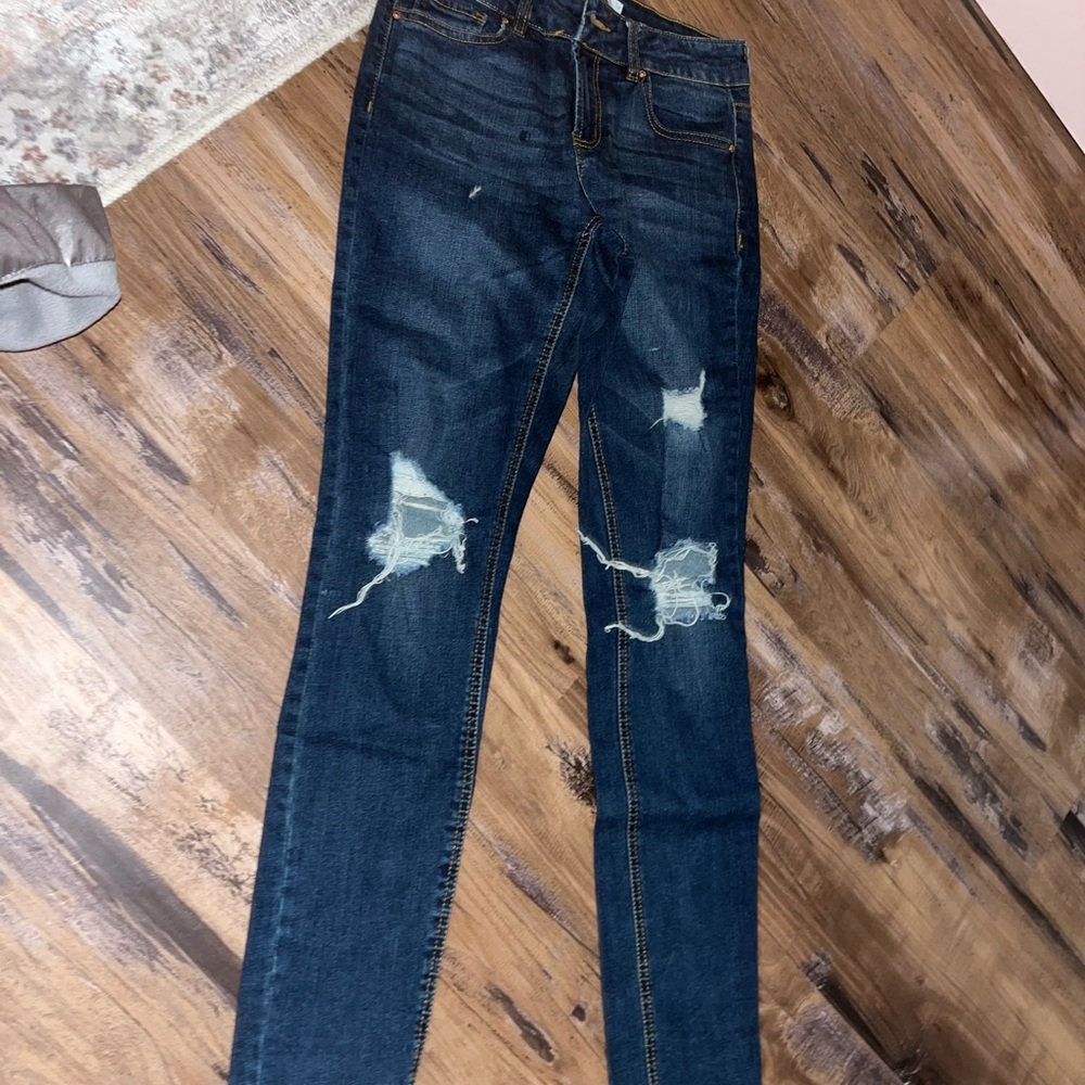 Medium wash ripped skinny jeans refuge